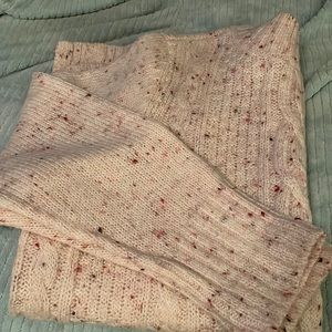 Sweater, pink with burgandy specks.